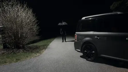 The Man with the Black Umbrella